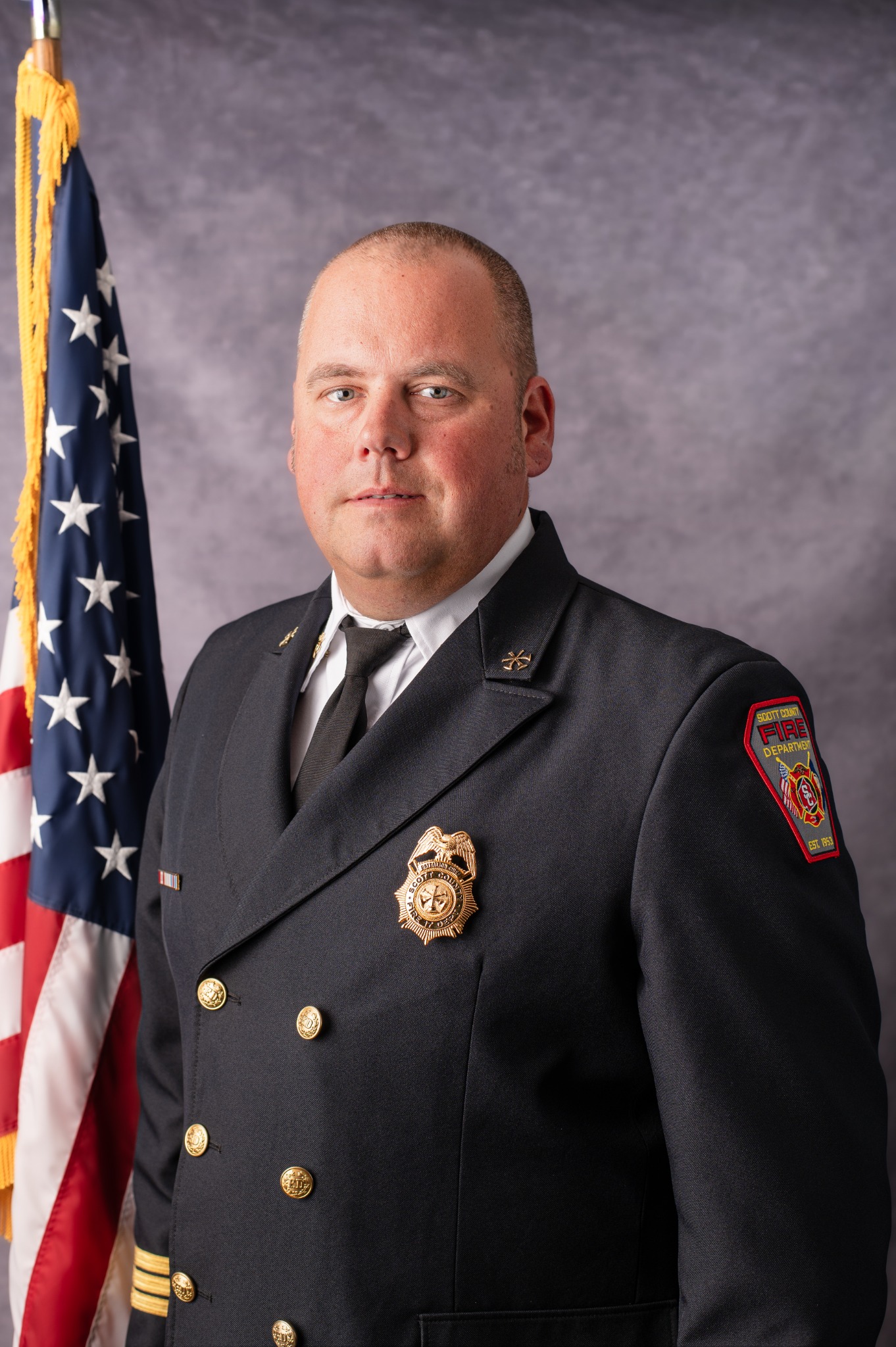 Battalion Chief Adam White in Scott County Fire Department dress uniform