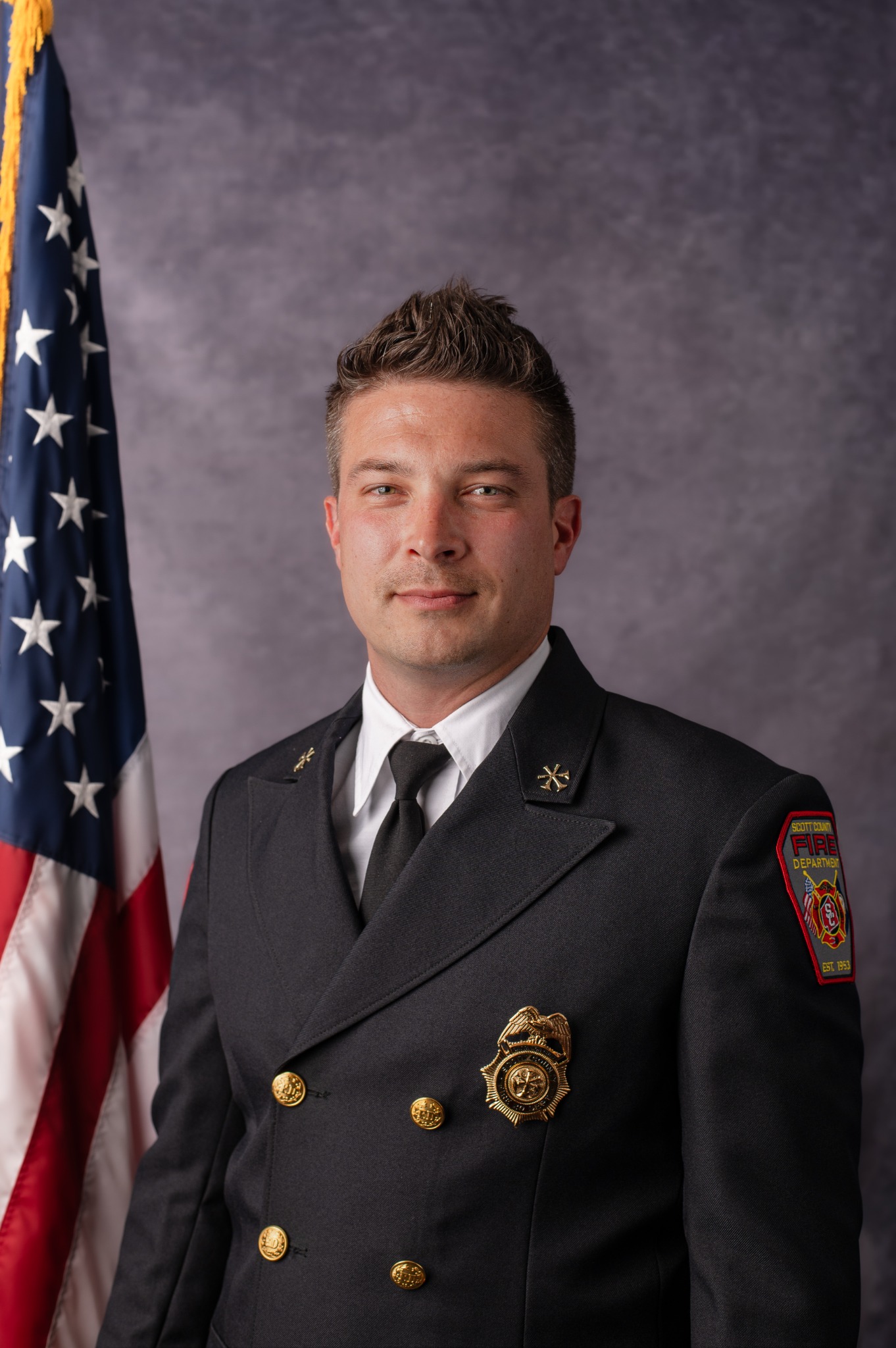 Battalion Chief Jeremy Barnett in Scott County Fire Department dress uniform